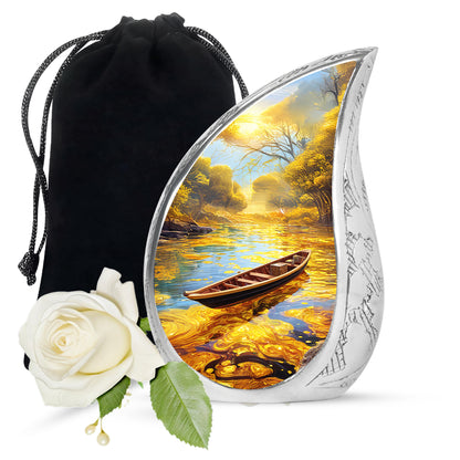 Sunrise Gold Boat Cremation Urn front view showing detailed design - rounded teardrop boat design with delicate detail - full-size 10 inch 200 cubic inch adult cremation urn