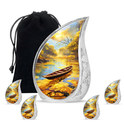 Sunrise Gold Boat Cremation Urn side profile showing urn shape - flowing teardrop boat silhouette on curved aluminum - memorial set with one large and four small urns