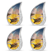 Warm Gold Boat Cremation Urn close-up of engraving and surface detail - graceful tear-shaped urn with boat motif - 10 inch aluminum urn for cremated remains