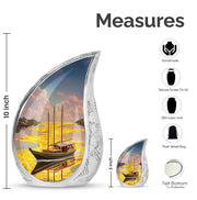 Antique Gold Boat Cremation Urn angled view of lid and engraved motif - rounded teardrop boat design with delicate detail - mini keepsake memorial for portion of cremation ashes
