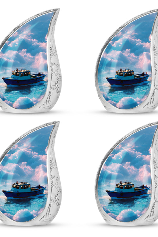 Pastel Blue Boat Cremation Urn close-up of engraving and surface detail - rounded teardrop boat design with delicate detail - 10 inch aluminum urn for cremated remains