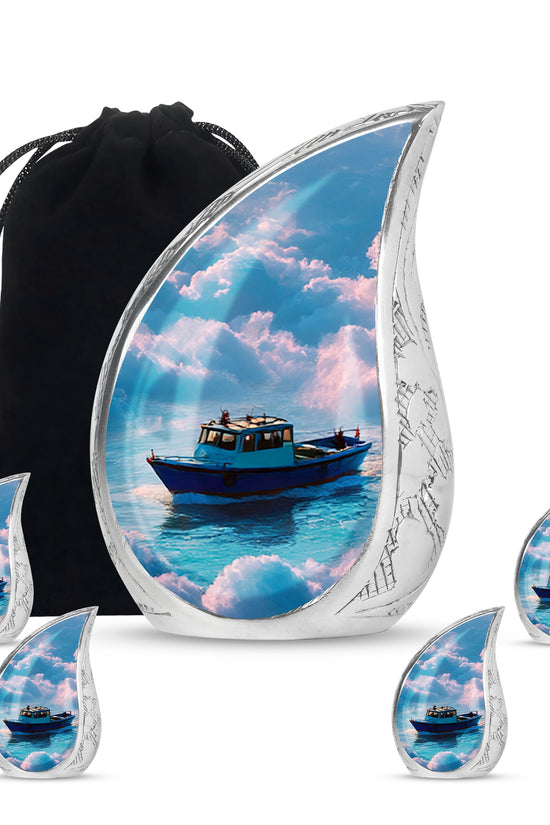 Dusty Blue Boat Cremation Urn side profile showing urn shape - rounded teardrop boat design with delicate detail - memorial set with one large and four small urns