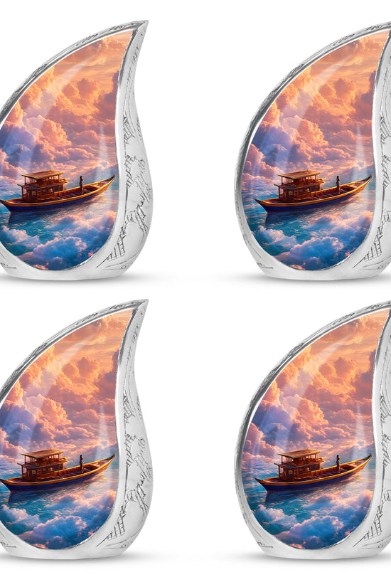 Burgundy Red Boat Cremation Urn close-up of engraving and surface detail - rounded teardrop boat design with delicate detail - 10 inch aluminum urn for cremated remains