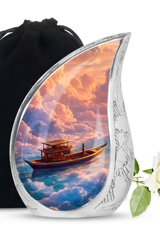 Cherry Red Boat Cremation Urn front view showing detailed design - smooth teardrop contour featuring boat art - full-size 10 inch 200 cubic inch adult cremation urn