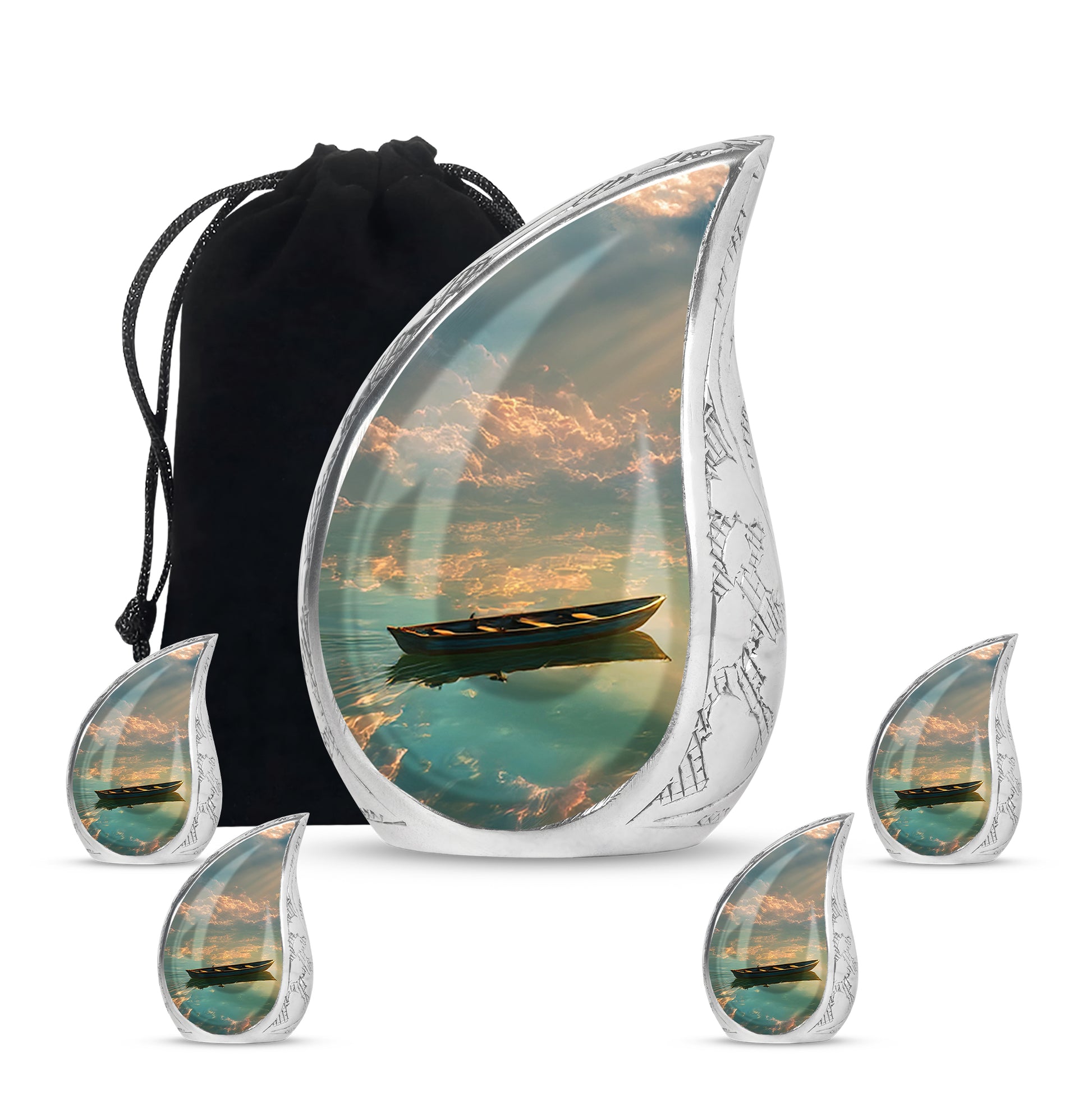 Ebony Boat Cremation Urn side profile showing urn shape - rounded teardrop boat design with delicate detail - memorial set with one large and four small urns