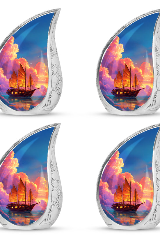 Steel Blue Boat Cremation Urn close-up of engraving and surface detail - smooth teardrop contour featuring boat art - 10 inch aluminum urn for cremated remains