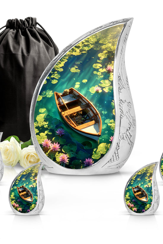 Vivid Blue Boat Cremation Urn side profile showing urn shape - smooth teardrop contour featuring boat art - memorial set with one large and four small urns