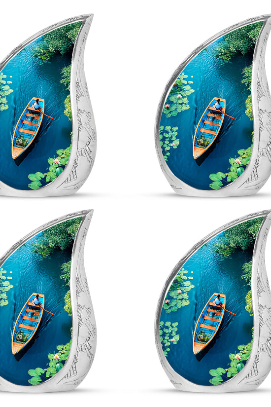 Cool Teal Boat Cremation Urn close-up of engraving and surface detail - flowing teardrop boat silhouette on curved aluminum - 10 inch aluminum urn for cremated remains