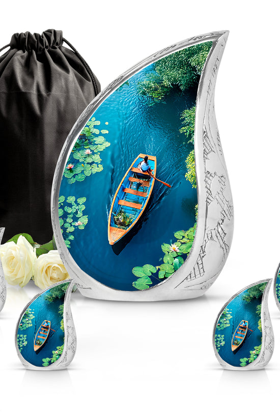 Sea Green Teal Boat Cremation Urn side profile showing urn shape - rounded teardrop boat design with delicate detail - memorial set with one large and four small urns