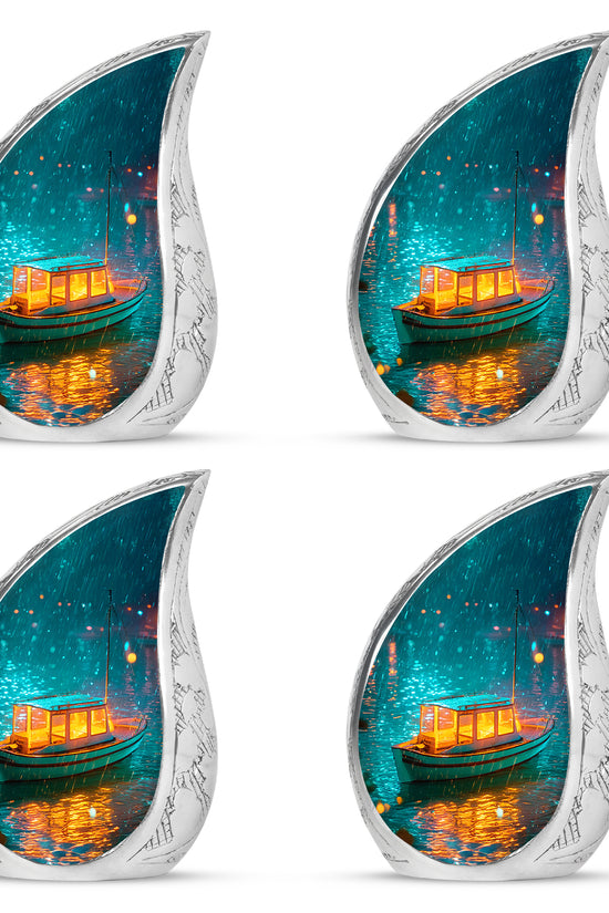 Aqua Teal Boat Cremation Urn close-up of engraving and surface detail - graceful tear-shaped urn with boat motif - 10 inch aluminum urn for cremated remains