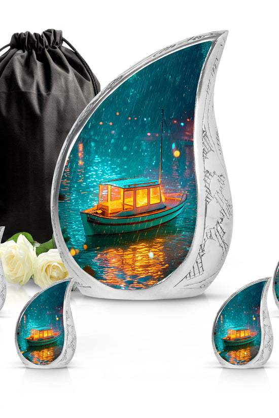 Jewel Teal Boat Cremation Urn side profile showing urn shape - rounded teardrop boat design with delicate detail - memorial set with one large and four small urns