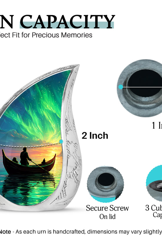 Soft Blue Boat Cremation Urn angled view of lid and engraved motif - smooth teardrop contour featuring boat art - mini keepsake memorial for portion of cremation ashes