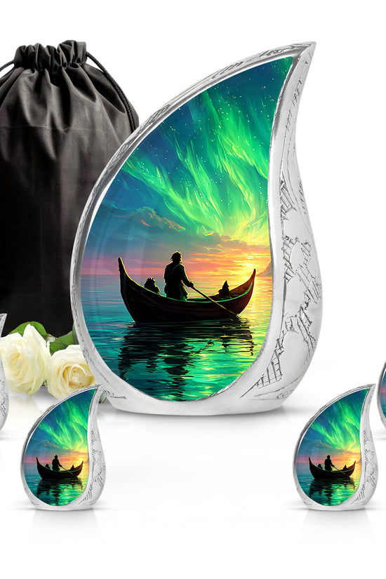 Royal Blue Boat Cremation Urn side profile showing urn shape - graceful tear-shaped urn with boat motif - memorial set with one large and four small urns