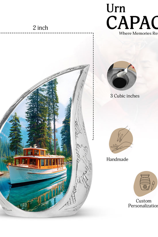 Cornflower Blue Boat Cremation Urn angled view of lid and engraved motif - smooth teardrop contour featuring boat art - mini keepsake memorial for portion of cremation ashes