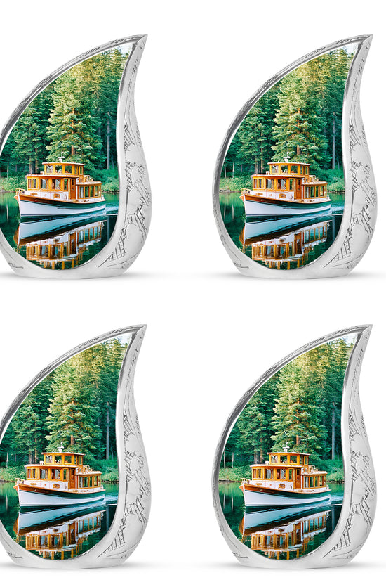 Cool Teal Boat Cremation Urn close-up of engraving and surface detail - flowing teardrop boat silhouette on curved aluminum - 10 inch aluminum urn for cremated remains