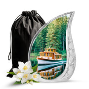 Deep Teal Boat Cremation Urn front view showing detailed design - smooth teardrop contour featuring boat art - full-size 10 inch 200 cubic inch adult cremation urn