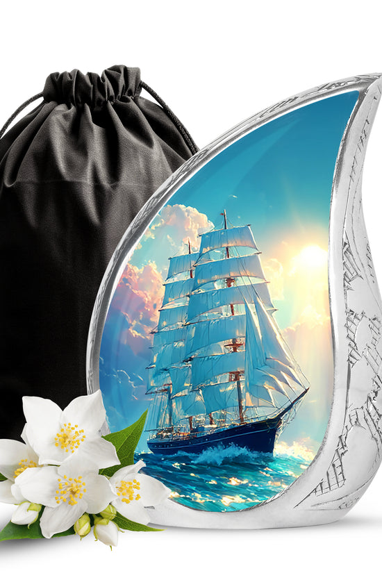 Vivid Teal Boat Cremation Urn front view showing detailed design - graceful tear-shaped urn with boat motif - full-size 10 inch 200 cubic inch adult cremation urn