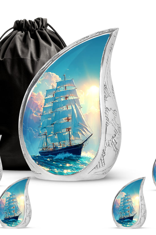 Cool Teal Boat Cremation Urn side profile showing urn shape - flowing teardrop boat silhouette on curved aluminum - memorial set with one large and four small urns