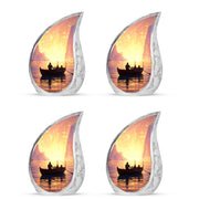 Cherry Red Boat Cremation Urn close-up of engraving and surface detail - graceful tear-shaped urn with boat motif - 10 inch aluminum urn for cremated remains