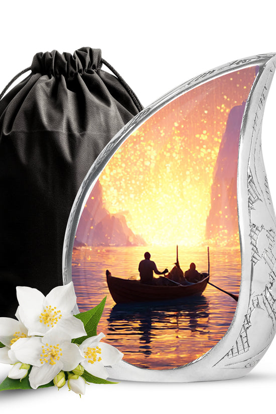 Garnet Red Boat Cremation Urn front view showing detailed design - rounded teardrop boat design with delicate detail - full-size 10 inch 200 cubic inch adult cremation urn