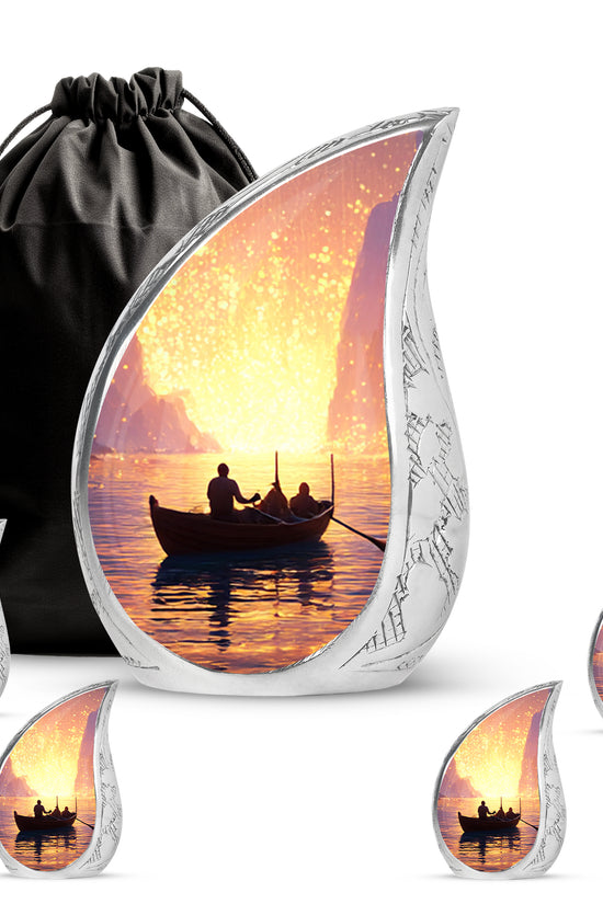 Wine Red Boat Cremation Urn side profile showing urn shape - flowing teardrop boat silhouette on curved aluminum - memorial set with one large and four small urns