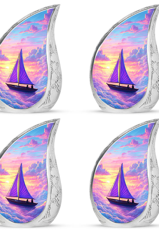 Vivid Blue Boat Cremation Urn close-up of engraving and surface detail - graceful tear-shaped urn with boat motif - 10 inch aluminum urn for cremated remains