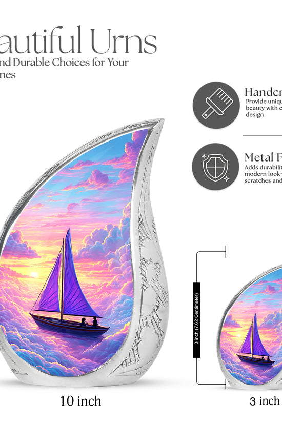 Pastel Blue Boat Cremation Urn angled view of lid and engraved motif - flowing teardrop boat silhouette on curved aluminum - mini keepsake memorial for portion of cremation ashes