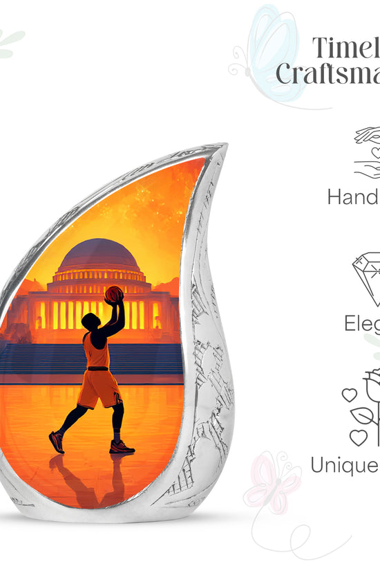 Cherry Red Basketball Cremation Urn angled view of lid and engraved motif - smooth teardrop contour featuring basketball art - mini keepsake memorial for portion of cremation ashes