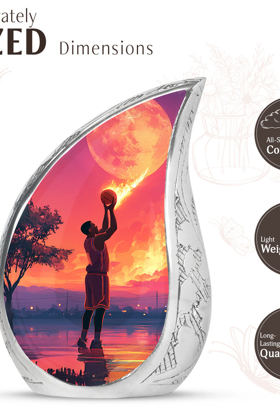 Slate Blue Basketball Cremation Urn angled view of lid and engraved motif - flowing teardrop basketball silhouette on curved aluminum - mini keepsake memorial for portion of cremation ashes