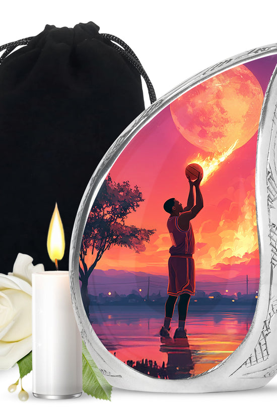 Sky Blue Basketball Cremation Urn front view showing detailed design - flowing teardrop basketball silhouette on curved aluminum - full-size 10 inch 200 cubic inch adult cremation urn
