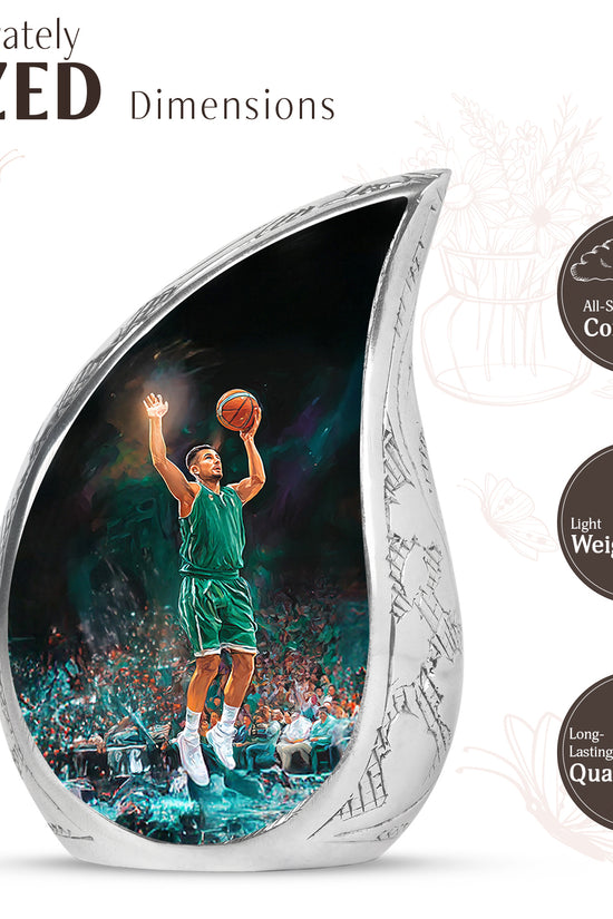 Rich Black Basketball Cremation Urn angled view of lid and engraved motif - rounded teardrop basketball design with delicate detail - mini keepsake memorial for portion of cremation ashes
