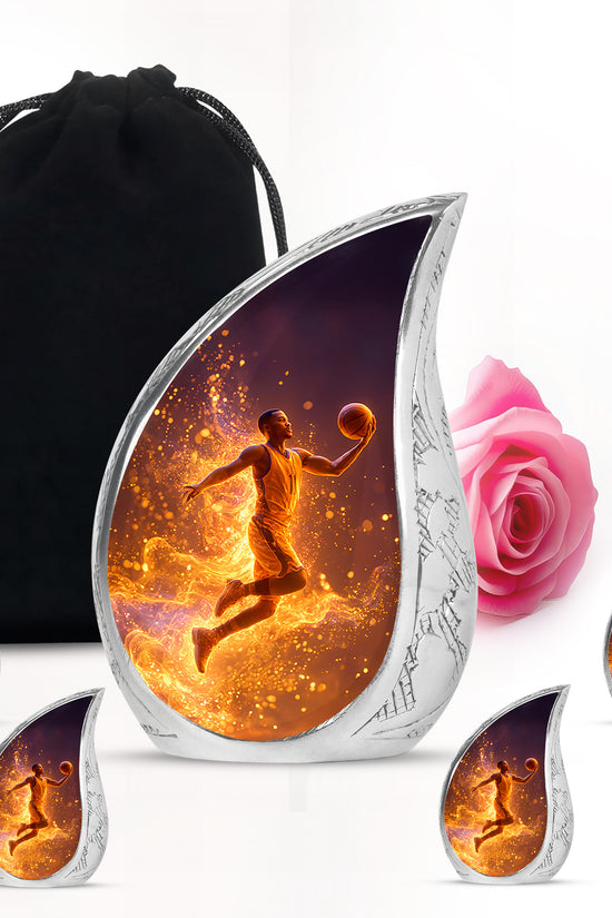 Jet Black Basketball Cremation Urn side profile showing urn shape - flowing teardrop basketball silhouette on curved aluminum - memorial set with one large and four small urns