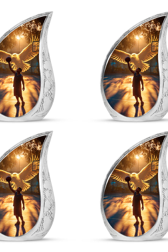 Jet Black Basketball Cremation Urn close-up of engraving and surface detail - flowing teardrop basketball silhouette on curved aluminum - 10 inch aluminum urn for cremated remains