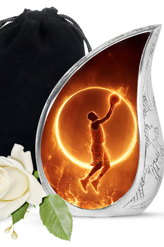 Jet Black Basketball Cremation Urn front view showing detailed design - flowing teardrop basketball silhouette on curved aluminum - full-size 10 inch 200 cubic inch adult cremation urn