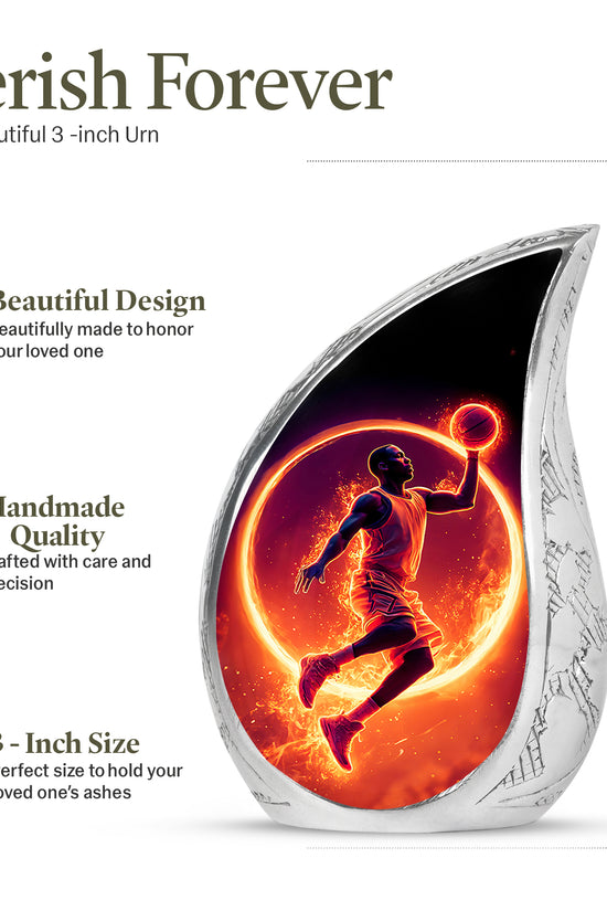 Glossy Black Basketball Cremation Urn angled view of lid and engraved motif - flowing teardrop basketball silhouette on curved aluminum - mini keepsake memorial for portion of cremation ashes