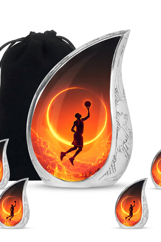 Obsidian Black Basketball Cremation Urn side profile showing urn shape - smooth teardrop contour featuring basketball art - memorial set with one large and four small urns