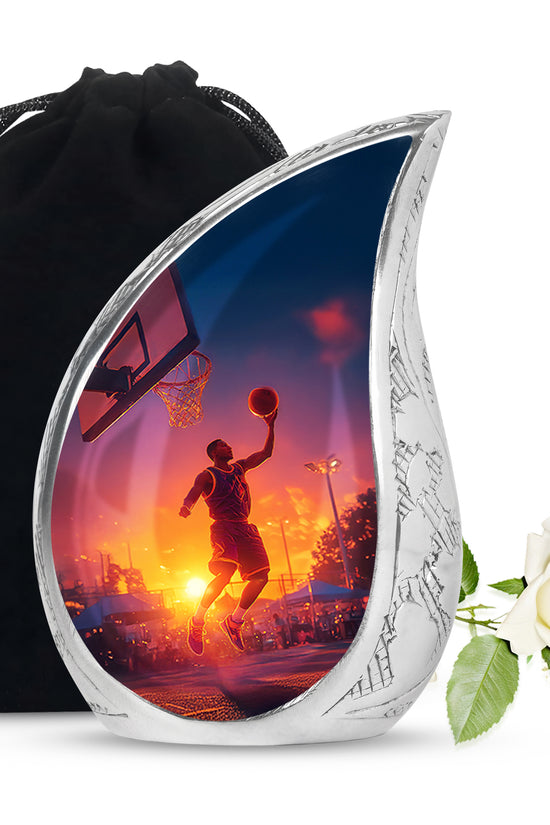 Slate Blue Basketball Cremation Urn front view showing detailed design - flowing teardrop basketball silhouette on curved aluminum - full-size 10 inch 200 cubic inch adult cremation urn
