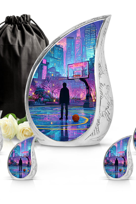 Icy Blue Basketball Cremation Urn side profile showing urn shape - rounded teardrop basketball design with delicate detail - memorial set with one large and four small urns
