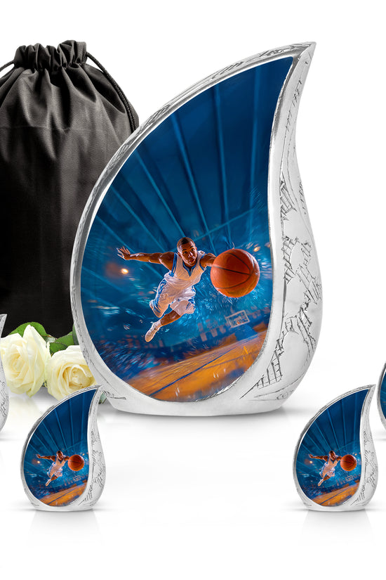 Pastel Blue Basketball Cremation Urn side profile showing urn shape - flowing teardrop basketball silhouette on curved aluminum - memorial set with one large and four small urns