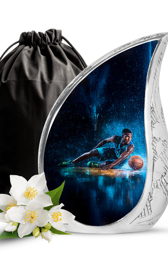 Glossy Black Basketball Cremation Urn front view showing detailed design - flowing teardrop basketball silhouette on curved aluminum - full-size 10 inch 200 cubic inch adult cremation urn