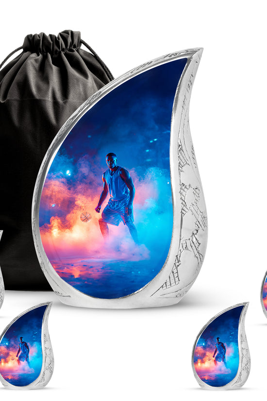 Celestial Blue Basketball Cremation Urn side profile showing urn shape - flowing teardrop basketball silhouette on curved aluminum - memorial set with one large and four small urns