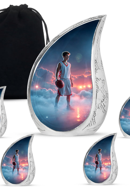 Cobalt Blue Basketball Cremation Urn side profile showing urn shape - graceful tear-shaped urn with basketball motif - memorial set with one large and four small urns