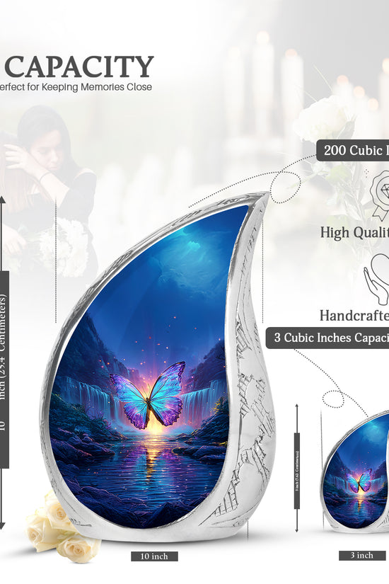 Icy Blue Butterfly Cremation Urn angled view of lid and engraved motif - rounded teardrop butterfly design with delicate detail - mini keepsake memorial for portion of cremation ashes