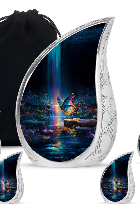 Twilight Blue Butterfly Cremation Urn side profile showing urn shape - smooth teardrop contour featuring butterfly art - memorial set with one large and four small urns
