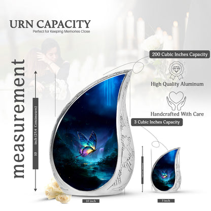 Soft Blue Butterfly Cremation Urn angled view of lid and engraved motif - smooth teardrop contour featuring butterfly art - mini keepsake memorial for portion of cremation ashes