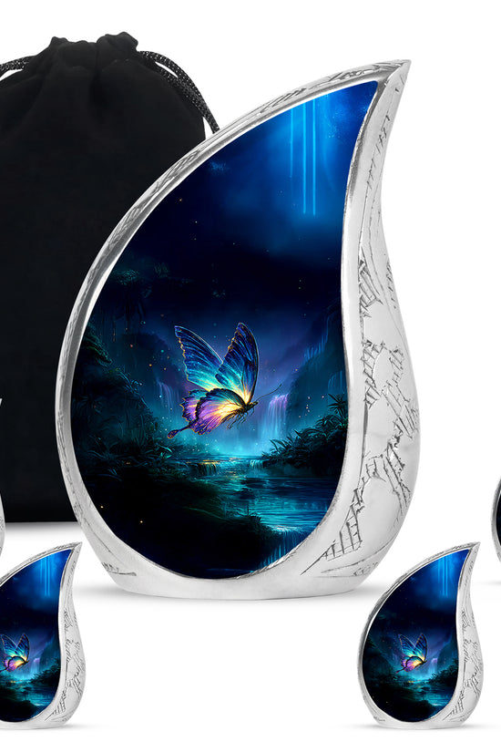 Misty Blue Butterfly Cremation Urn side profile showing urn shape - flowing teardrop butterfly silhouette on curved aluminum - memorial set with one large and four small urns