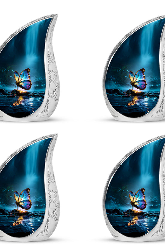 Twilight Blue Butterfly Cremation Urn close-up of engraving and surface detail - smooth teardrop contour featuring butterfly art - 10 inch aluminum urn for cremated remains