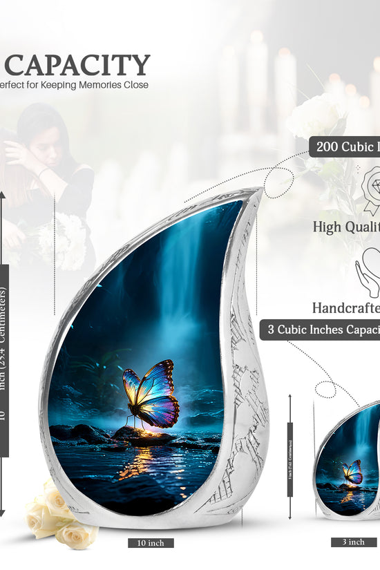 Sky Blue Butterfly Cremation Urn angled view of lid and engraved motif - flowing teardrop butterfly silhouette on curved aluminum - mini keepsake memorial for portion of cremation ashes