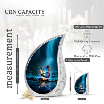 Sky Blue Butterfly Cremation Urn angled view of lid and engraved motif - flowing teardrop butterfly silhouette on curved aluminum - mini keepsake memorial for portion of cremation ashes