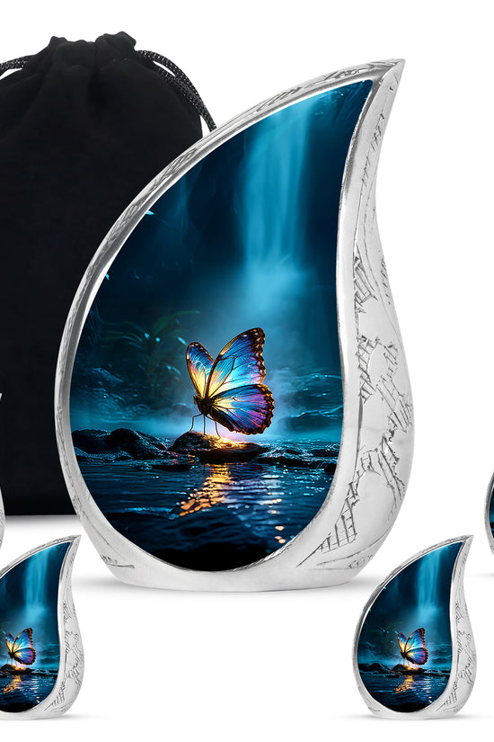 Vivid Blue Butterfly Cremation Urn side profile showing urn shape - graceful tear-shaped urn with butterfly motif - memorial set with one large and four small urns